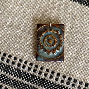 Handmade pottery sunshine necklace charm